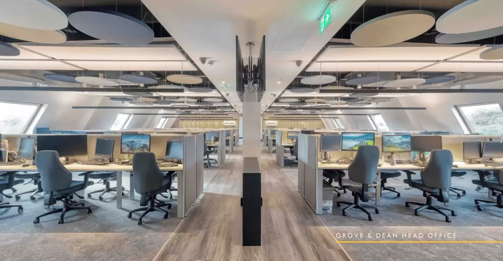 Photo of call centre large office space with bright open plan design and modern workplace lighting