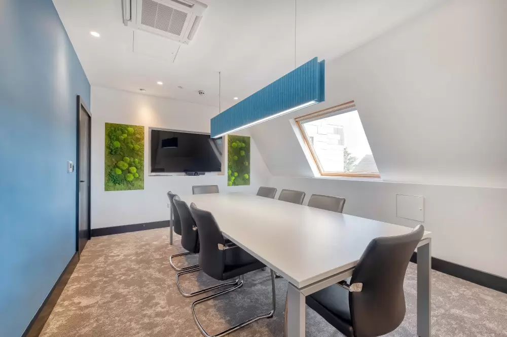 Photo of call centre office interior with minimalist design and contemporary lighting