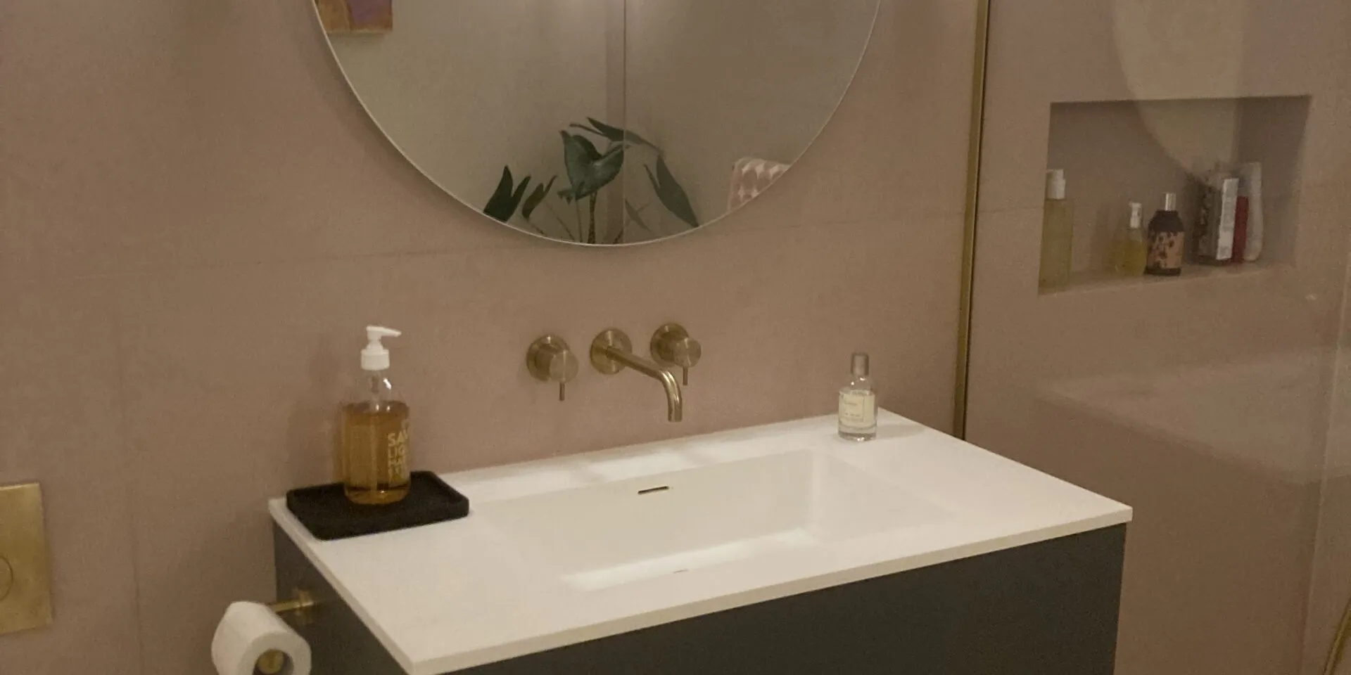 Photo of east dulwich grand designs bathroom featuring wall-mounted lighting fixtures and contemporary minimalist design