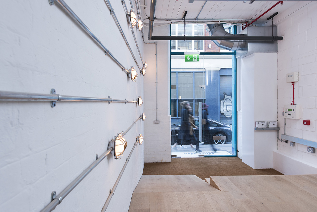 zetland-house-office-entrance-lighting Photo of zetland house office entrance with bright contemporary lighting and glass partition design
